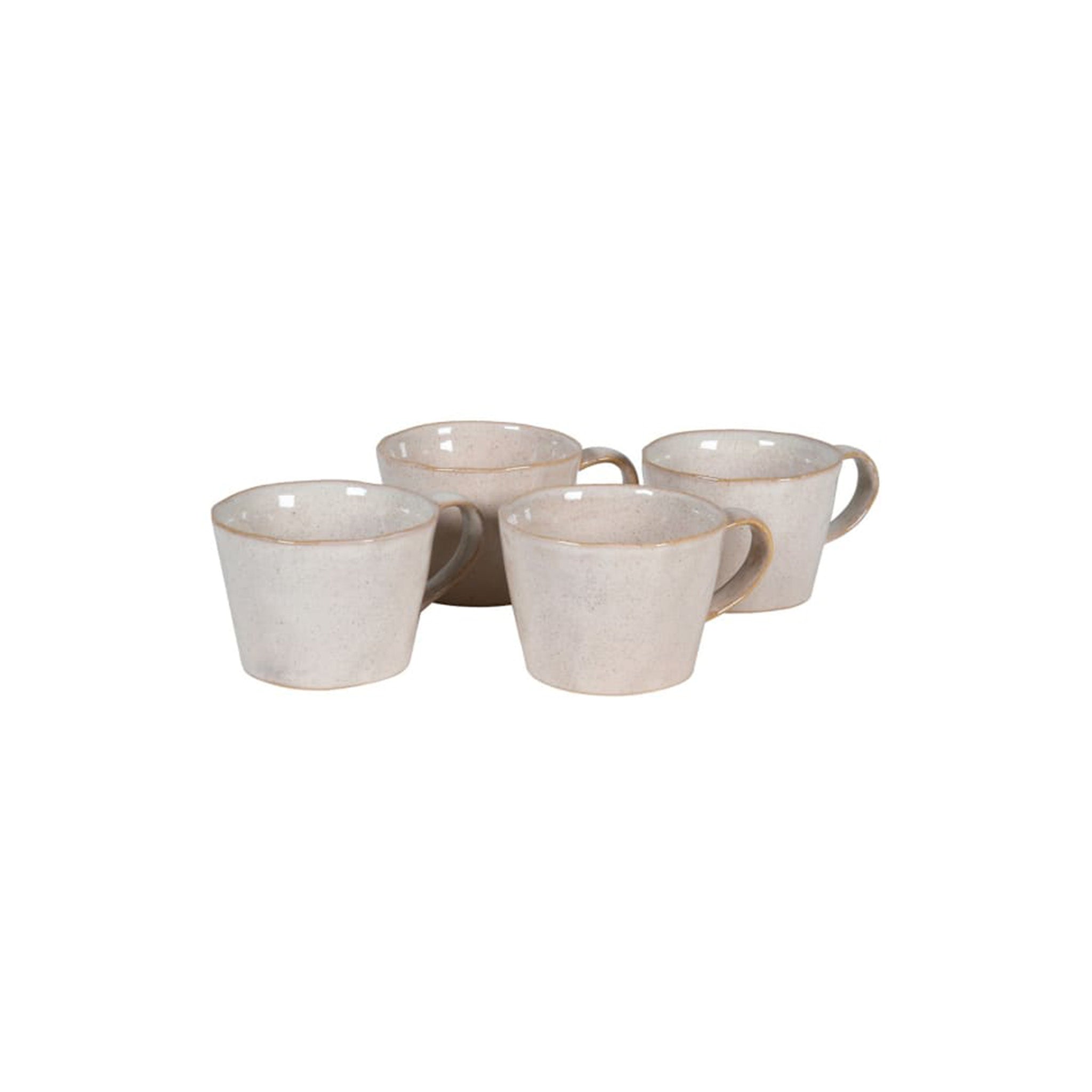 Stoneware ceramic organic shape cream short mugs, in a set of 4. Dimensions: H:70 W:140 D:100 mm Materials: Stoneware Delivery: 7-10 days